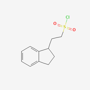 molecular formula C11H13ClO2S B2924474 2-(2,3-dihydro-1H-inden-1-yl)ethane-1-sulfonyl chloride CAS No. 1781060-23-8
