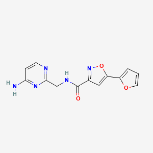 N-[(4-Aminopyrimidin-2-yl)methyl]-5-(furan-2-yl)-1,2-oxazole-3-carboxamide