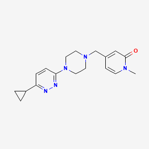 molecular formula C18H23N5O B2925267 4-[[4-(6-Cyclopropylpyridazin-3-yl)piperazin-1-yl]methyl]-1-methylpyridin-2-one CAS No. 2415510-24-4