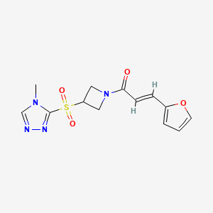 molecular formula C13H14N4O4S B2925584 (E)-3-(furan-2-yl)-1-(3-((4-methyl-4H-1,2,4-triazol-3-yl)sulfonyl)azetidin-1-yl)prop-2-en-1-one CAS No. 2035000-85-0