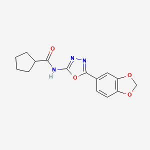 molecular formula C15H15N3O4 B2925871 N-(5-(benzo[d][1,3]dioxol-5-yl)-1,3,4-oxadiazol-2-yl)cyclopentanecarboxamide CAS No. 1172029-92-3