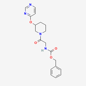 molecular formula C19H22N4O4 B2926491 苄基 (2-氧代-2-(3-(嘧啶-4-氧基)哌啶-1-基)乙基)氨基甲酸酯 CAS No. 2034472-12-1