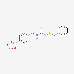 2-(benzylthio)-N-((6-(furan-2-yl)pyridin-3-yl)methyl)acetamide