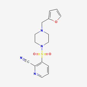 molecular formula C15H16N4O3S B2927100 3-[4-(Furan-2-ylmethyl)piperazin-1-yl]sulfonylpyridine-2-carbonitrile CAS No. 2224241-19-2