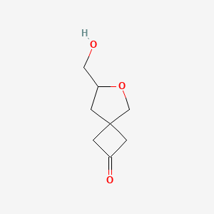 molecular formula C8H12O3 B2928357 7-(羟甲基)-6-氧代螺[3.4]辛烷-2-酮 CAS No. 2059971-87-6