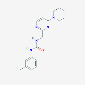 molecular formula C19H25N5O B2928702 1-(3,4-Dimethylphenyl)-3-((4-(piperidin-1-yl)pyrimidin-2-yl)methyl)urea CAS No. 1797078-02-4
