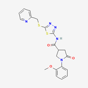 B2928785 1-(2-methoxyphenyl)-5-oxo-N-(5-((pyridin-2-ylmethyl)thio)-1,3,4-thiadiazol-2-yl)pyrrolidine-3-carboxamide CAS No. 872595-23-8