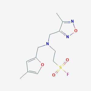 molecular formula C12H16FN3O4S B2928976 2-[(4-Methylfuran-2-yl)methyl-[(4-methyl-1,2,5-oxadiazol-3-yl)methyl]amino]ethanesulfonyl fluoride CAS No. 2411256-81-8