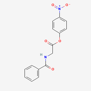 molecular formula C15H12N2O5 B2929581 4-nitrophenyl N-benzoylglycinate CAS No. 3101-11-9