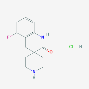 molecular formula C13H16ClFN2O B2931636 5'-氟-2',4'-二氢-1'H-螺[哌啶-4,3'-喹啉]-2'-酮盐酸盐 CAS No. 1402232-86-3