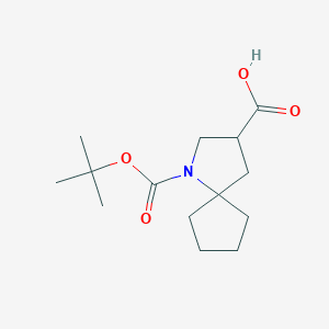 molecular formula C14H23NO4 B2933311 1-[(2-Methylpropan-2-yl)oxycarbonyl]-1-azaspiro[4.4]nonane-3-carboxylic acid CAS No. 2344684-97-3