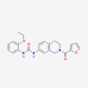 molecular formula C23H23N3O4 B2934218 1-(2-Ethoxyphenyl)-3-(2-(furan-2-carbonyl)-1,2,3,4-tetrahydroisoquinolin-7-yl)urea CAS No. 1207053-54-0