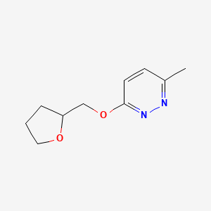 B2935492 3-Methyl-6-[(oxolan-2-yl)methoxy]pyridazine CAS No. 2175978-36-4