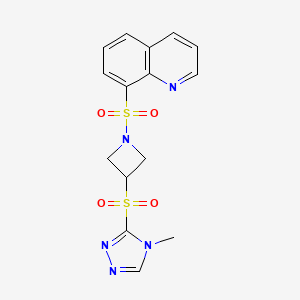 molecular formula C15H15N5O4S2 B2935892 8-((3-((4-methyl-4H-1,2,4-triazol-3-yl)sulfonyl)azetidin-1-yl)sulfonyl)quinoline CAS No. 2034489-00-2