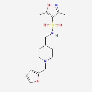 molecular formula C16H23N3O4S B2935970 N-((1-(furan-2-ylmethyl)piperidin-4-yl)methyl)-3,5-dimethylisoxazole-4-sulfonamide CAS No. 1210843-65-4