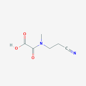 [(2-Cyanoethyl)(methyl)carbamoyl]formic acid