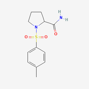 1-(4-Methylphenyl)sulfonylpyrrolidine-2-carboxamide