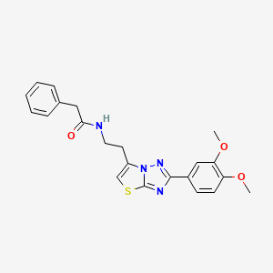 molecular formula C22H22N4O3S B2939192 N-(2-(2-(3,4-二甲氧苯基)噻唑并[3,2-b][1,2,4]三唑-6-基)乙基)-2-苯基乙酰胺 CAS No. 894025-68-4