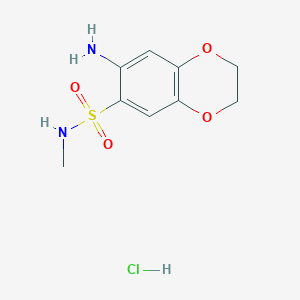 molecular formula C9H13ClN2O4S B2939508 7-Amino-N-methyl-2,3-dihydrobenzo[b][1,4]dioxine-6-sulfonamide hydrochloride CAS No. 1366386-66-4