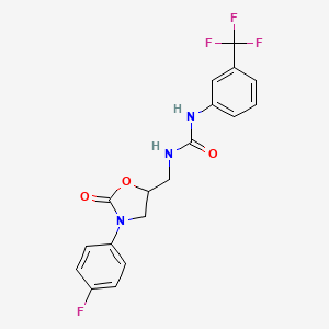 molecular formula C18H15F4N3O3 B2939969 1-((3-(4-Fluorophenyl)-2-oxooxazolidin-5-yl)methyl)-3-(3-(trifluoromethyl)phenyl)urea CAS No. 954633-01-3