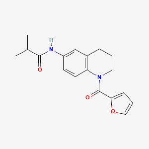 molecular formula C18H20N2O3 B2940846 N-(1-(furan-2-carbonyl)-1,2,3,4-tetrahydroquinolin-6-yl)isobutyramide CAS No. 941960-55-0