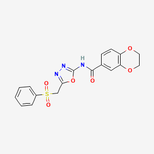 molecular formula C18H15N3O6S B2941457 N-(5-((phenylsulfonyl)methyl)-1,3,4-oxadiazol-2-yl)-2,3-dihydrobenzo[b][1,4]dioxine-6-carboxamide CAS No. 923482-28-4
