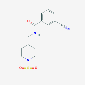 molecular formula C15H19N3O3S B2941847 3-氰基-N-((1-(甲磺酰基)哌啶-4-基)甲基)苯甲酰胺 CAS No. 1234867-17-4