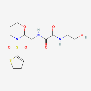 N1-(2-hydroxyethyl)-N2-((3-(thiophen-2-ylsulfonyl)-1,3-oxazinan-2-yl)methyl)oxalamide