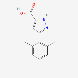 molecular formula C13H14N2O2 B2944045 5-Mesityl-1H-pyrazole-3-carboxylic acid CAS No. 1037690-98-4