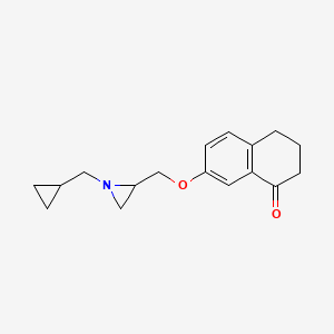 molecular formula C17H21NO2 B2944222 7-[[1-(Cyclopropylmethyl)aziridin-2-yl]methoxy]-3,4-dihydro-2H-naphthalen-1-one CAS No. 2418729-20-9