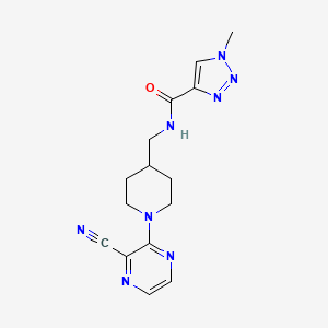 molecular formula C15H18N8O B2944457 N-((1-(3-cyanopyrazin-2-yl)piperidin-4-yl)methyl)-1-methyl-1H-1,2,3-triazole-4-carboxamide CAS No. 1796969-71-5