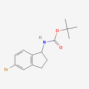 molecular formula C14H18BrNO2 B2944813 tert-butyl (5-bromo-2,3-dihydro-1H-inden-1-yl)carbamate CAS No. 903555-95-3