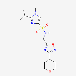 molecular formula C15H23N5O4S B2945075 1-methyl-N-{[3-(oxan-4-yl)-1,2,4-oxadiazol-5-yl]methyl}-2-(propan-2-yl)-1H-imidazole-4-sulfonamide CAS No. 2034226-67-8