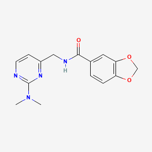 molecular formula C15H16N4O3 B2946035 N-((2-(dimethylamino)pyrimidin-4-yl)methyl)benzo[d][1,3]dioxole-5-carboxamide CAS No. 1797621-11-4