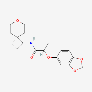 molecular formula C18H23NO5 B2946326 2-(benzo[d][1,3]dioxol-5-yloxy)-N-(7-oxaspiro[3.5]nonan-1-yl)propanamide CAS No. 2320515-90-8