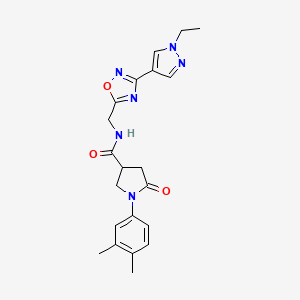 molecular formula C21H24N6O3 B2946747 1-(3,4-dimethylphenyl)-N-((3-(1-ethyl-1H-pyrazol-4-yl)-1,2,4-oxadiazol-5-yl)methyl)-5-oxopyrrolidine-3-carboxamide CAS No. 2034228-95-8