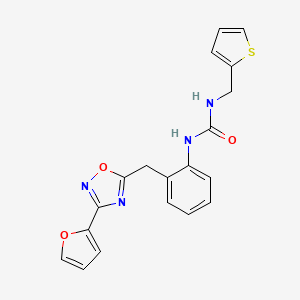 B2949316 1-(2-((3-(Furan-2-yl)-1,2,4-oxadiazol-5-yl)methyl)phenyl)-3-(thiophen-2-ylmethyl)urea CAS No. 1797603-33-8