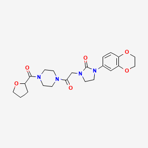 molecular formula C22H28N4O6 B2949447 1-(2,3-Dihydrobenzo[b][1,4]dioxin-6-yl)-3-(2-oxo-2-(4-(tetrahydrofuran-2-carbonyl)piperazin-1-yl)ethyl)imidazolidin-2-one CAS No. 1286722-38-0