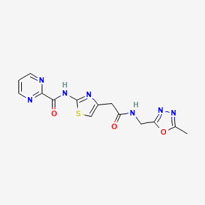 molecular formula C14H13N7O3S B2951163 N-(4-(2-(((5-methyl-1,3,4-oxadiazol-2-yl)methyl)amino)-2-oxoethyl)thiazol-2-yl)pyrimidine-2-carboxamide CAS No. 1286695-44-0