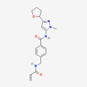 N-[2-Methyl-5-(oxolan-2-yl)pyrazol-3-yl]-4-[(prop-2-enoylamino)methyl]benzamide