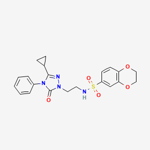 molecular formula C21H22N4O5S B2951660 N-(2-(3-cyclopropyl-5-oxo-4-phenyl-4,5-dihydro-1H-1,2,4-triazol-1-yl)ethyl)-2,3-dihydrobenzo[b][1,4]dioxine-6-sulfonamide CAS No. 1396751-84-0