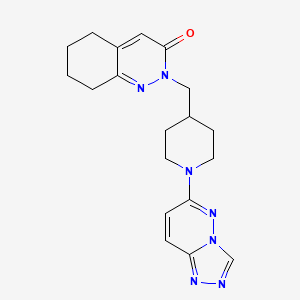 molecular formula C19H23N7O B2952942 2-[(1-{[1,2,4]三唑并[4,3-b]哒嗪-6-基}哌啶-4-基)甲基]-2,3,5,6,7,8-六氢茚满-3-酮 CAS No. 2097869-10-6