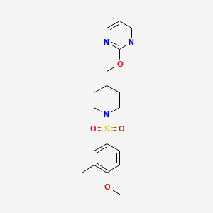 molecular formula C18H23N3O4S B2953502 2-[[1-(4-Methoxy-3-methylphenyl)sulfonylpiperidin-4-yl]methoxy]pyrimidine CAS No. 2379995-78-3