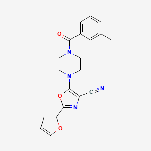 molecular formula C20H18N4O3 B2953512 2-(呋喃-2-基)-5-(4-(3-甲基苯甲酰)哌嗪-1-基)恶唑-4-腈 CAS No. 946278-33-7