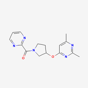 molecular formula C15H17N5O2 B2955675 2,4-Dimethyl-6-{[1-(pyrimidine-2-carbonyl)pyrrolidin-3-yl]oxy}pyrimidine CAS No. 2097895-03-7