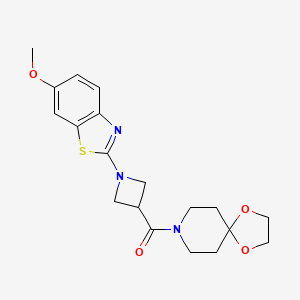 molecular formula C19H23N3O4S B2955928 (1-(6-Methoxybenzo[d]thiazol-2-yl)azetidin-3-yl)(1,4-dioxa-8-azaspiro[4.5]decan-8-yl)methanone CAS No. 1286719-96-7