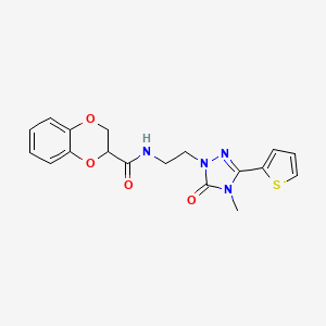 molecular formula C18H18N4O4S B2957174 N-(2-(4-methyl-5-oxo-3-(thiophen-2-yl)-4,5-dihydro-1H-1,2,4-triazol-1-yl)ethyl)-2,3-dihydrobenzo[b][1,4]dioxine-2-carboxamide CAS No. 1203257-63-9