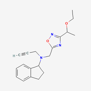 molecular formula C19H23N3O2 B2957890 N-[[3-(1-Ethoxyethyl)-1,2,4-oxadiazol-5-yl]methyl]-N-prop-2-ynyl-2,3-dihydro-1H-inden-1-amine CAS No. 1385313-52-9