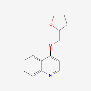 molecular formula C14H15NO2 B2958415 4-[(Oxolan-2-yl)methoxy]quinoline CAS No. 2195875-98-8