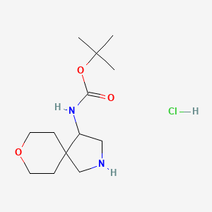 molecular formula C13H25ClN2O3 B2958526 叔丁基 (8-氧杂-2-氮杂螺[4.5]癸-4-基)氨基甲酸酯盐酸盐 CAS No. 2155852-24-5